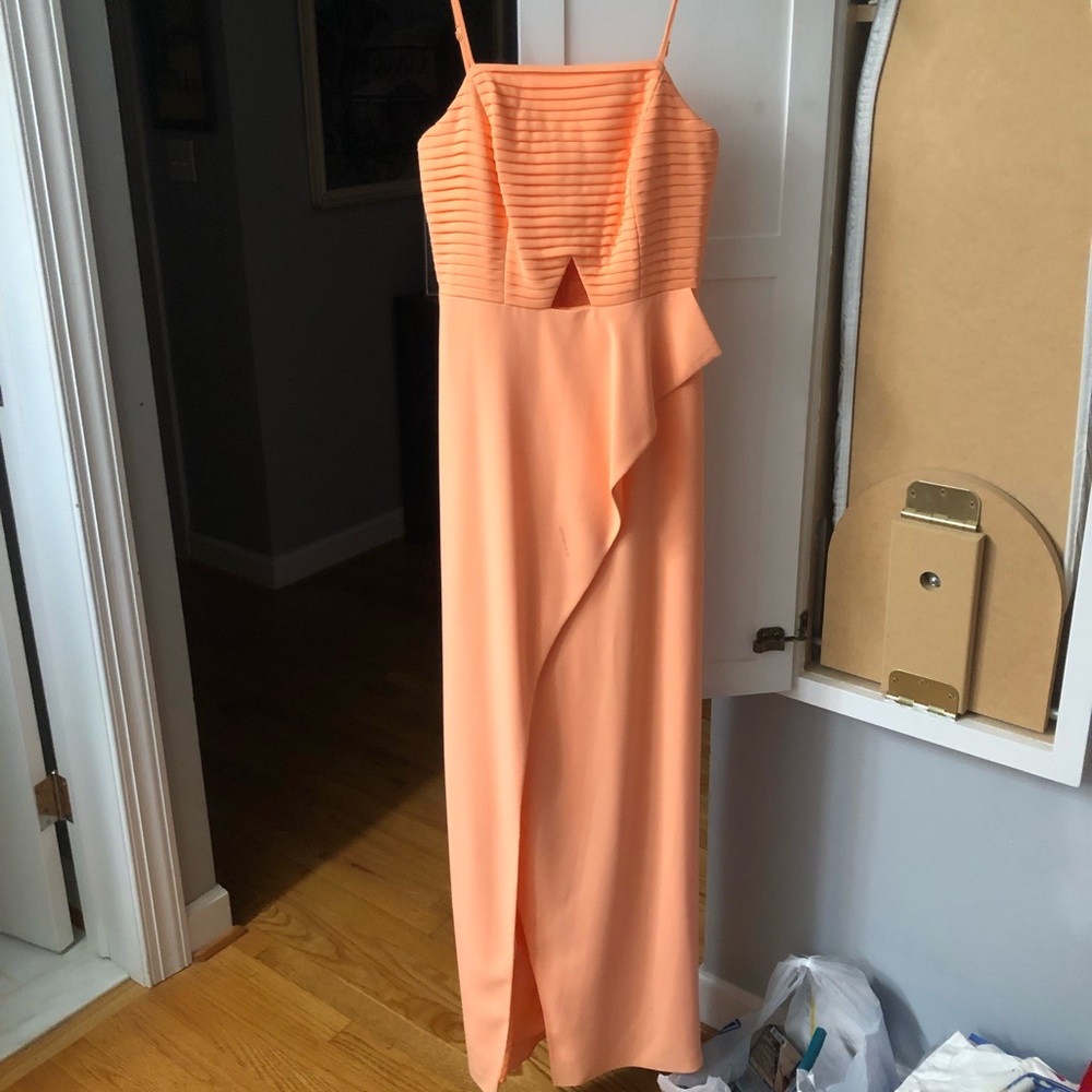 Beautiful peach long gown with straps and a ruffle